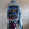Jeans jas met patchwork.