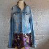 Jeans jas met patchwork.