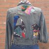 Jeans jas met patchwork.