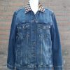 Jeans jas met patchwork.